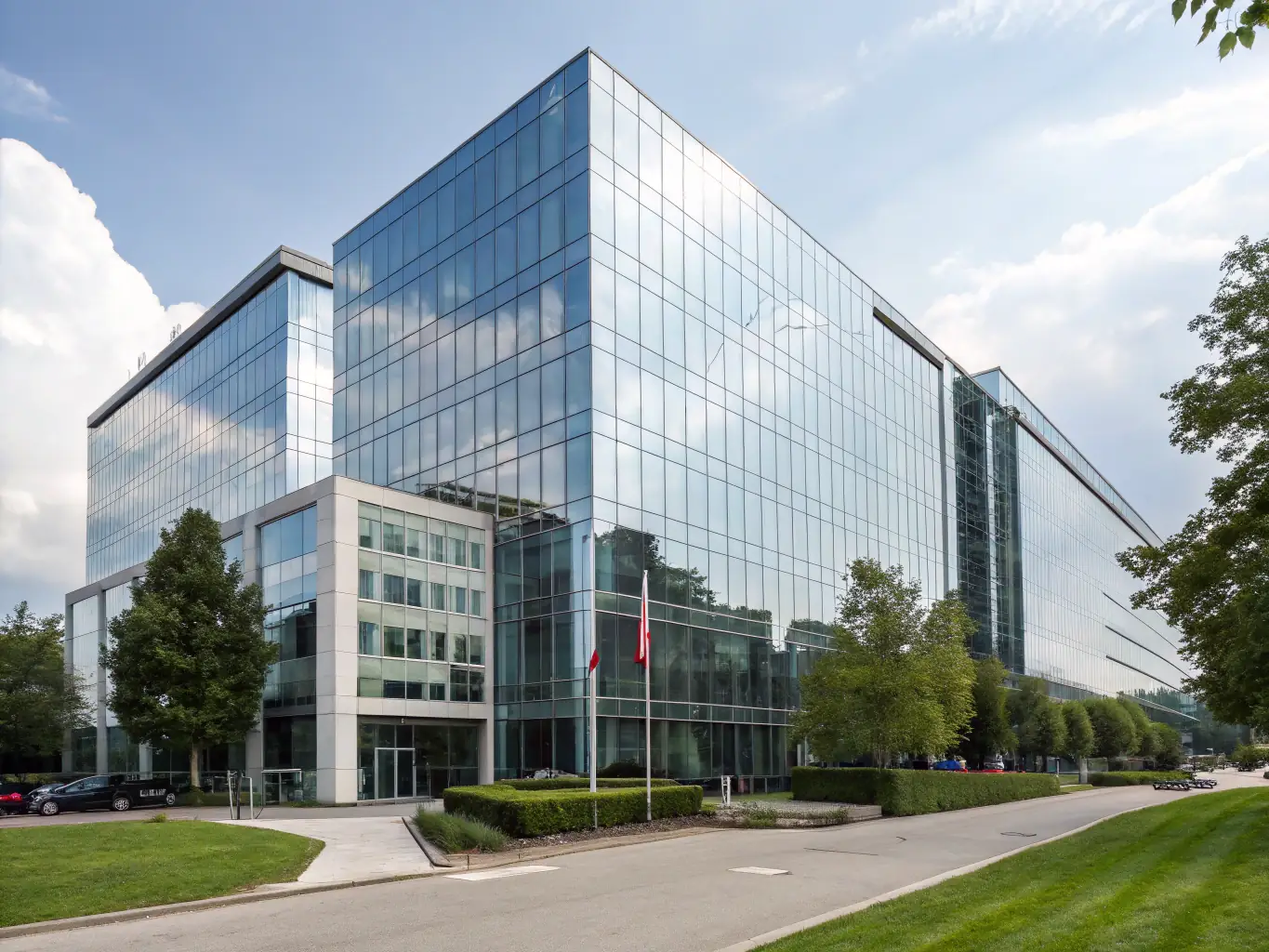 A modern office building exterior during daytime, symbolizing company registration services. The sky is clear, and the building reflects professionalism and stability.